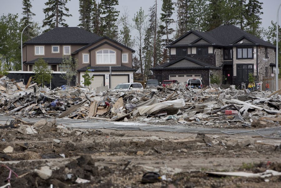 The devastated neighbourhood of Timberlea in Fort McMurray Alta. is shown on Wednesday June 1, 2016. Residents returned after being evacuated during wildfires. THE CANADIAN PRESS/Jason Franson