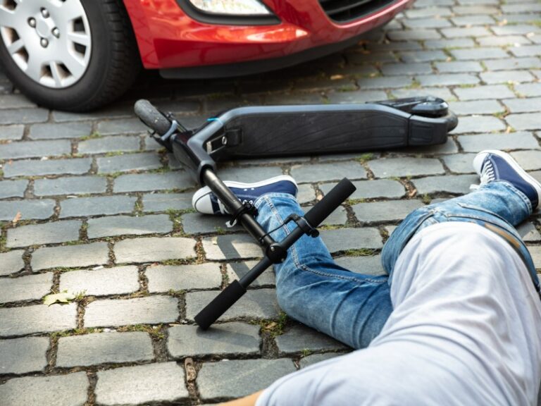 What types of injuries happen when escooters collide with cars?