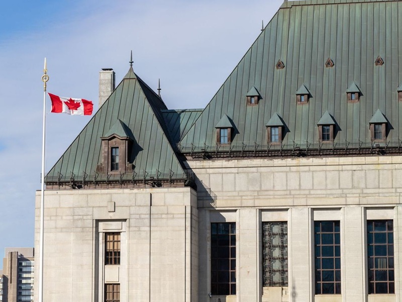 Supreme Court of Canada building with flag