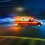 A man jumps out of the way of a truck, which then kills his fiancée. Is he “involved in” an accident?