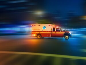 A man jumps out of the way of a truck, which then kills his fiancée. Is he “involved in” an accident? Image