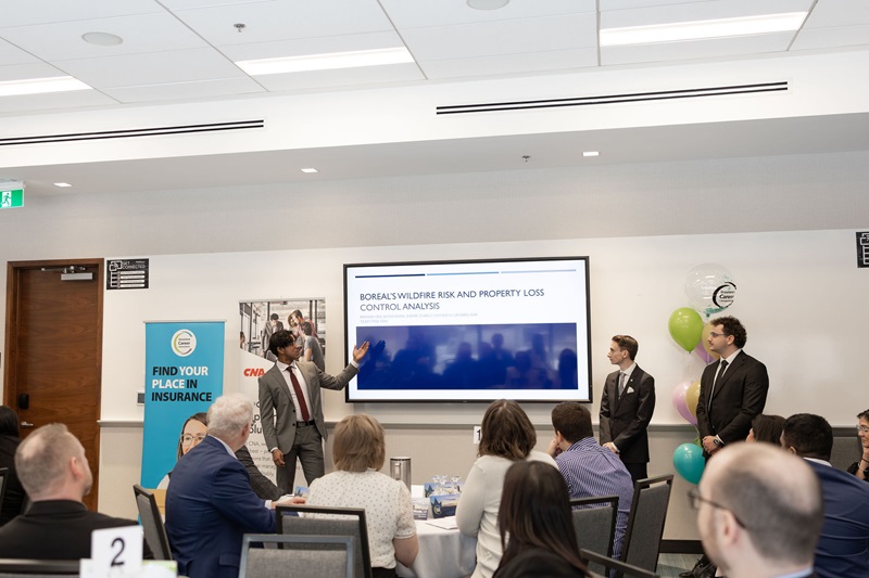 Mount Royal team members deliver their final presentation to the judges
