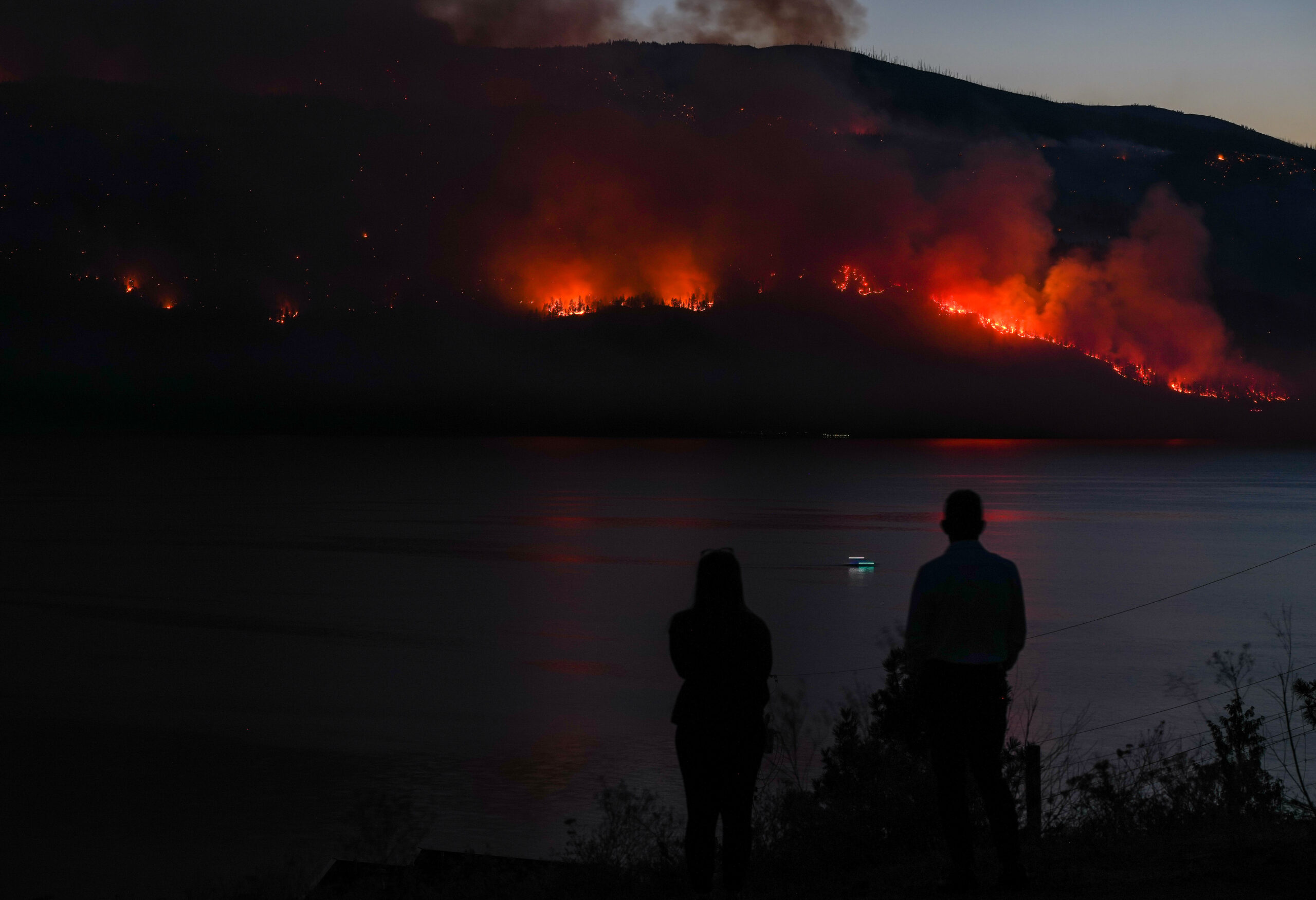 Southern B.C. wildfires continue to burn as fire ban violators caught